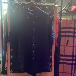 This is a button up polo dress shirt.